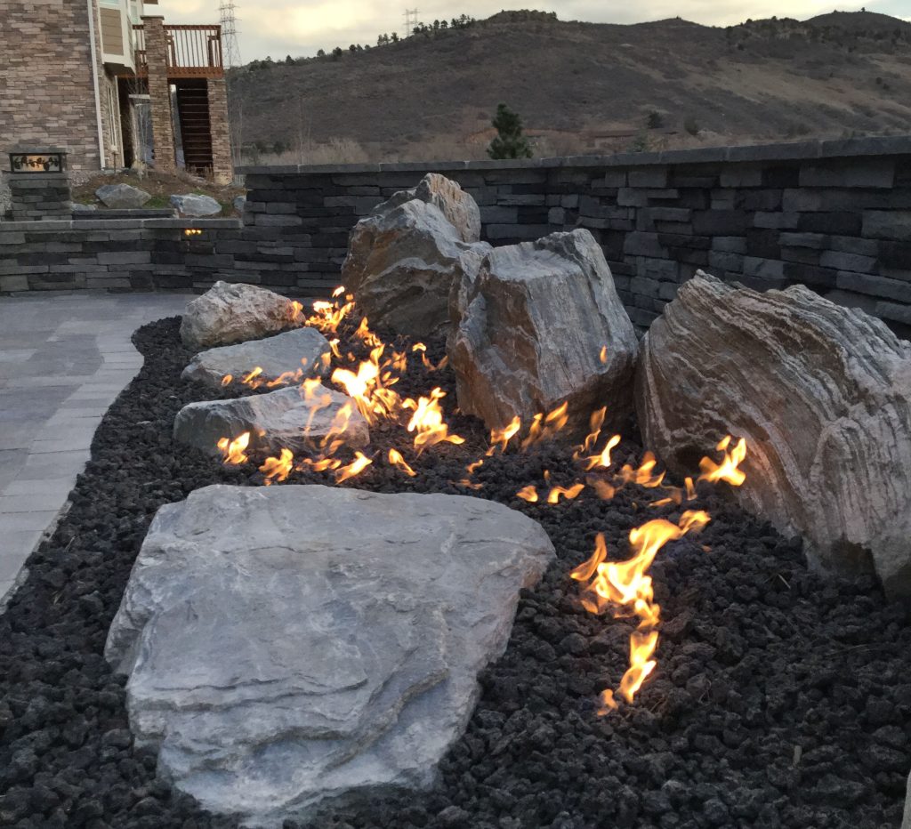 Boulder Garden with a custom Warming Trends® CROSSFIRE® Brass Burner